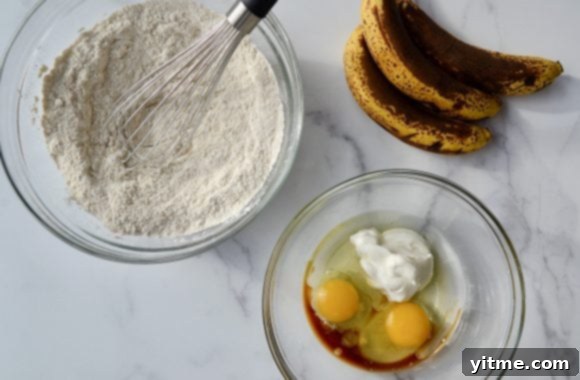 Greek Yogurt Banana Bread Bliss 4 Glass bowls containing the ingredients to make Greek Yogurt Banana Bread