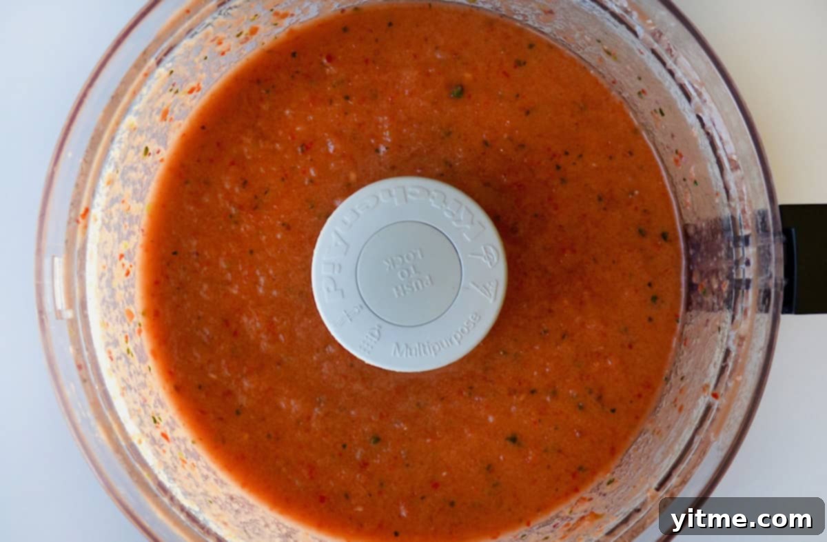 Blended gazpacho in a food processor.