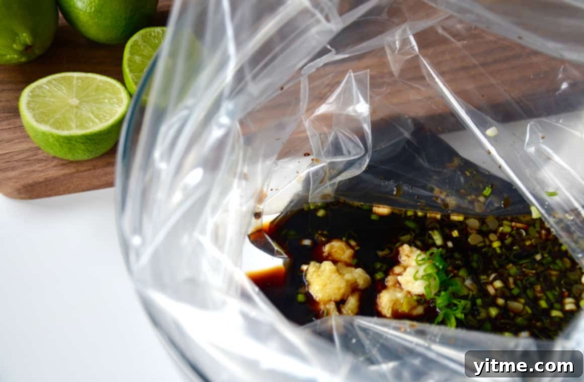 A plastic bag containing an Asian-inspired marinade for chicken thighs