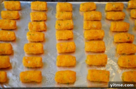 Golden Butternut Bites 6 A foil-lined baking sheet with butternut squash tots