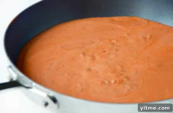 Vodka pasta sauce in a nonstick pan