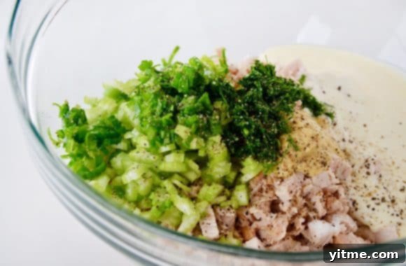 Chopped ingredients for Leftover Turkey Salad in a clear bowl