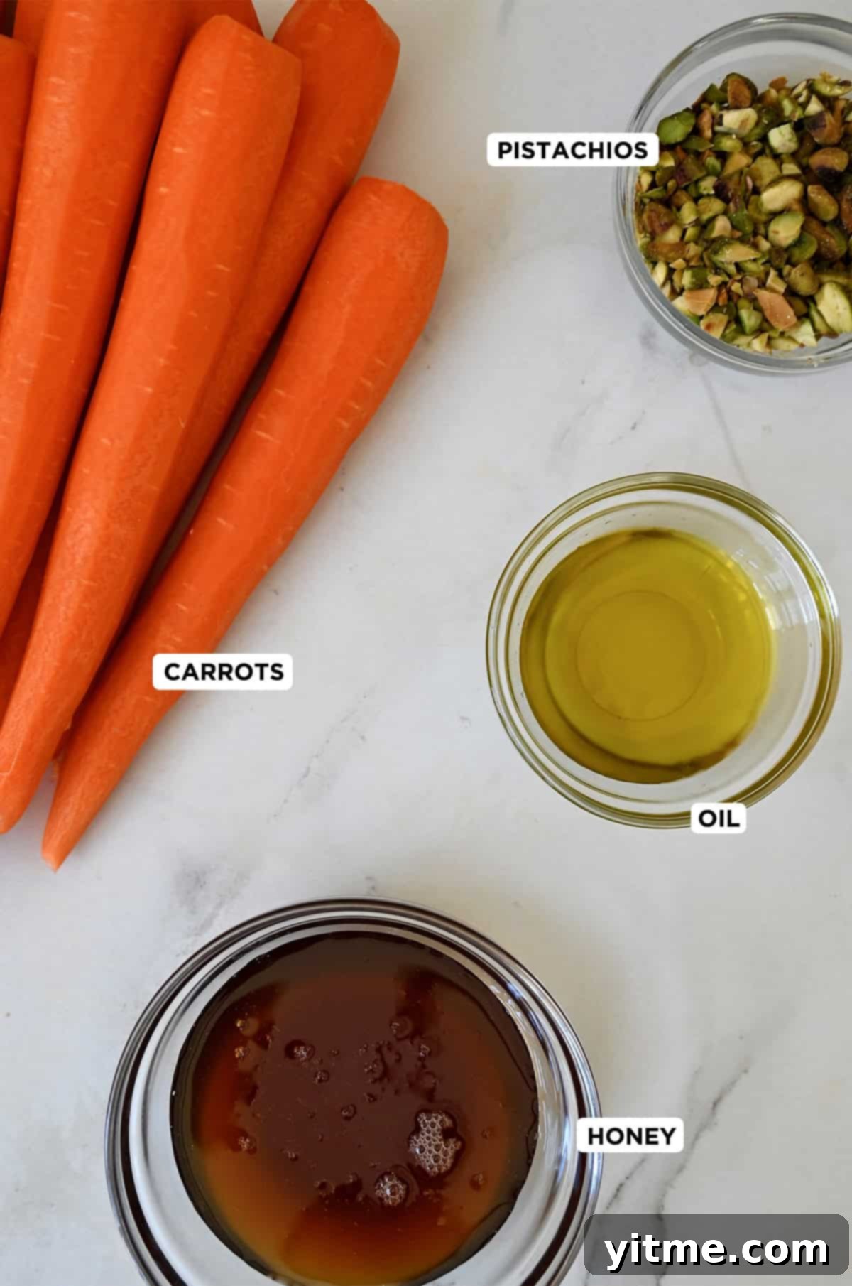 Honey-Glazed Roasted Carrots 4 Ingredients for honey roasted carrots: carrots, olive oil, and honey.