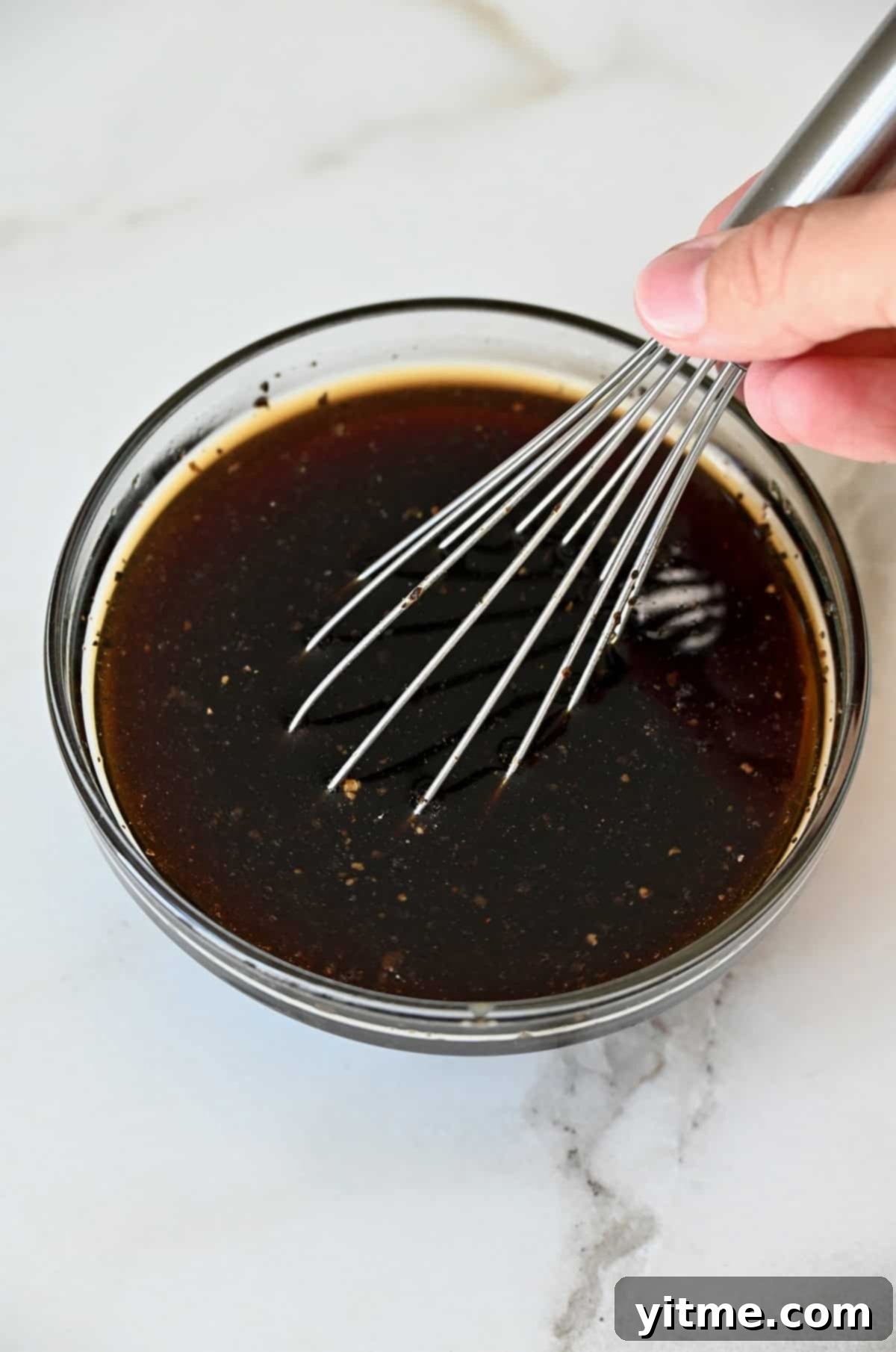 Black pepper sauce in a bowl.