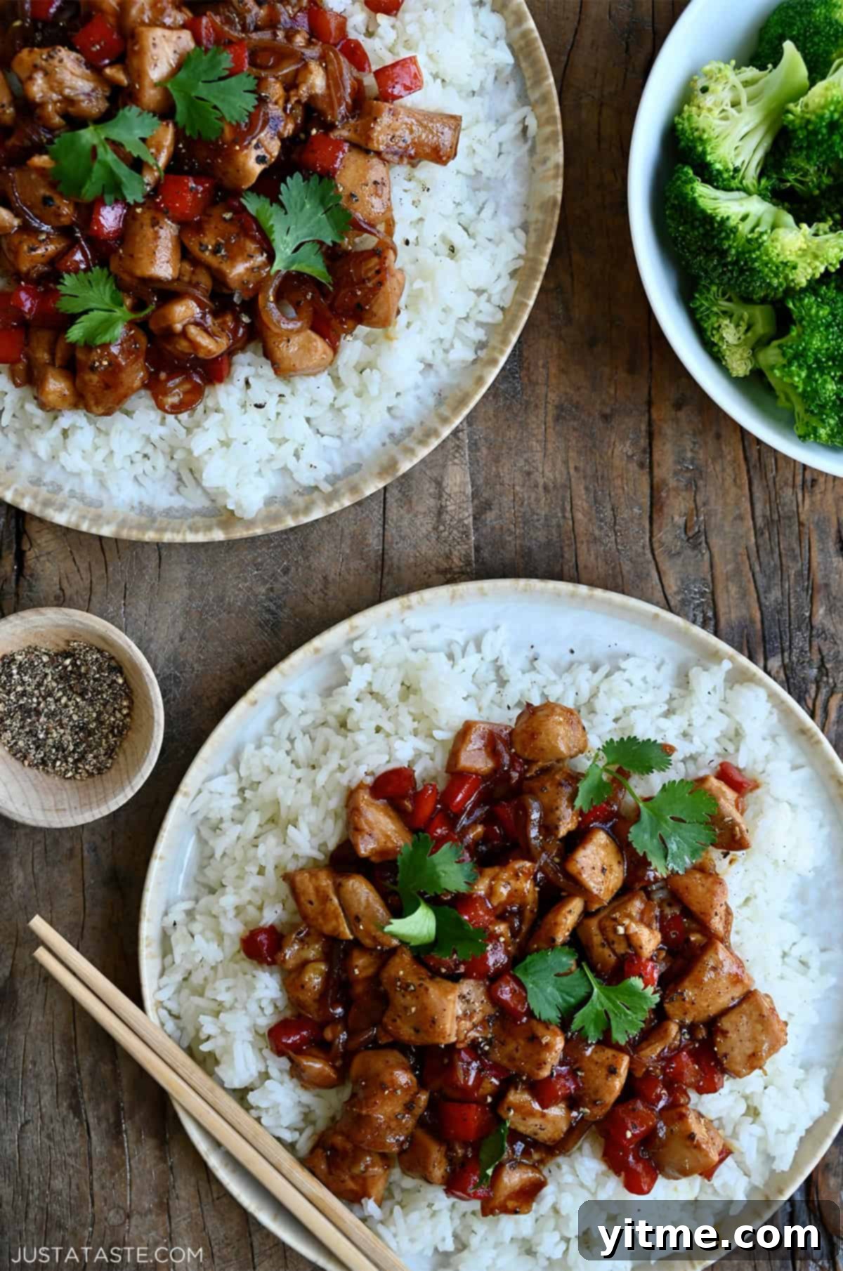 Black pepper chicken served with rice.