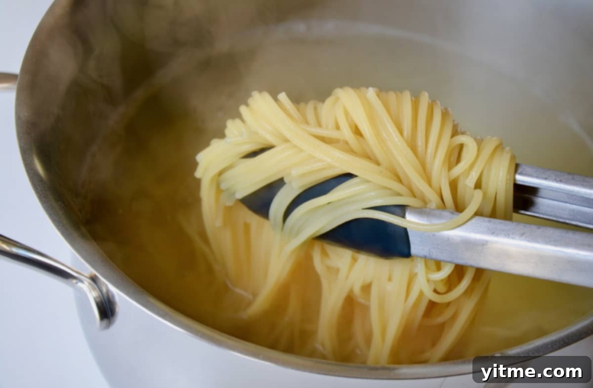 Cooking spaghetti in boiling water