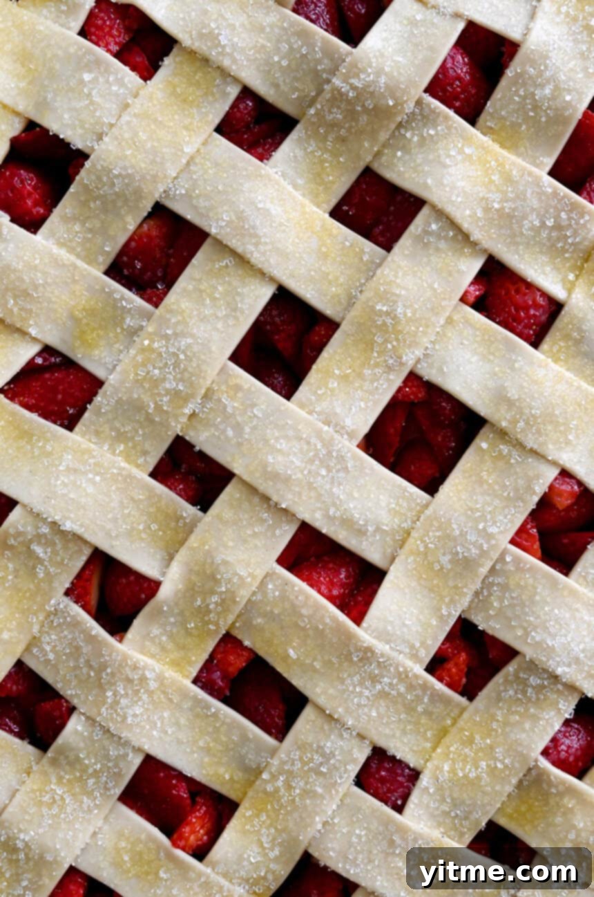 Lattice crust topped with egg wash and sprinkled with sanding sugar