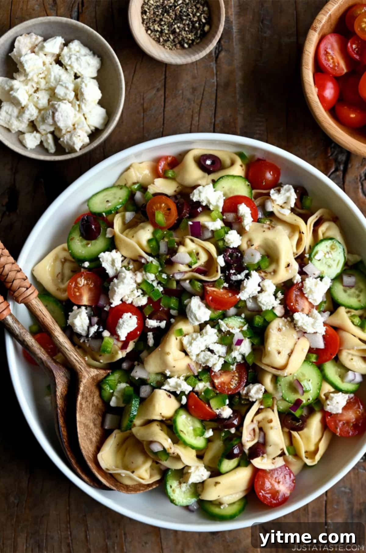 Greek Tortellini Pasta Salad with olives, cherry tomatoes, and feta cheese