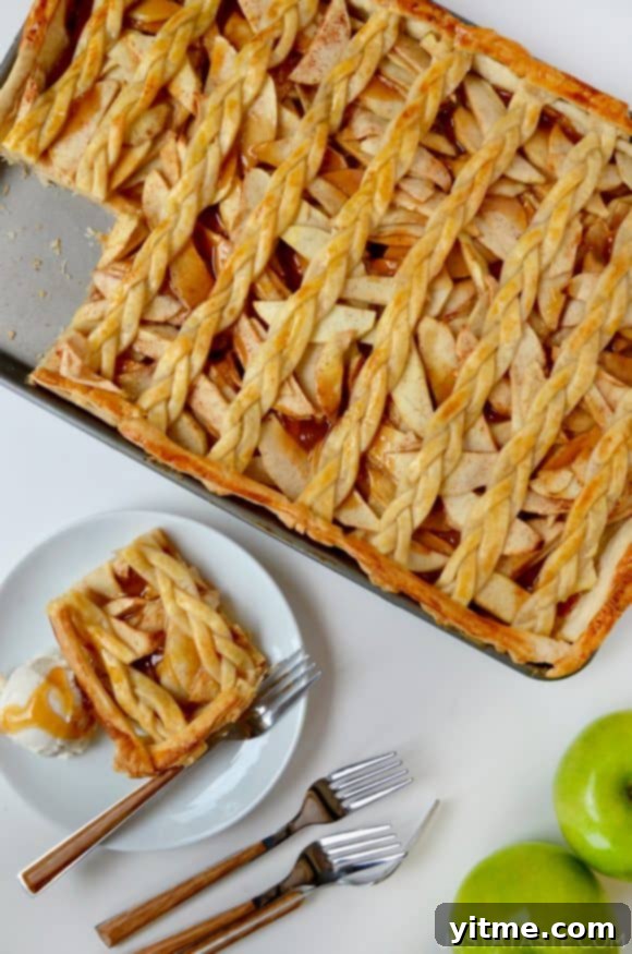A caramel apple slab pie with a piece cut out