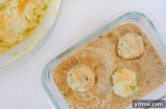 Leftover Mashed Potato Balls rolled in seasoned breadcrumbs before frying