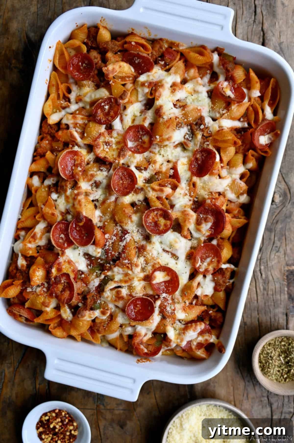 Baked pizza pasta casserole with pepperoni and mozzarella cheese