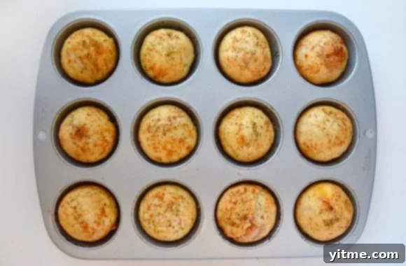 Golden brown and freshly baked Muffin Tin Pizza Pockets ready to be enjoyed