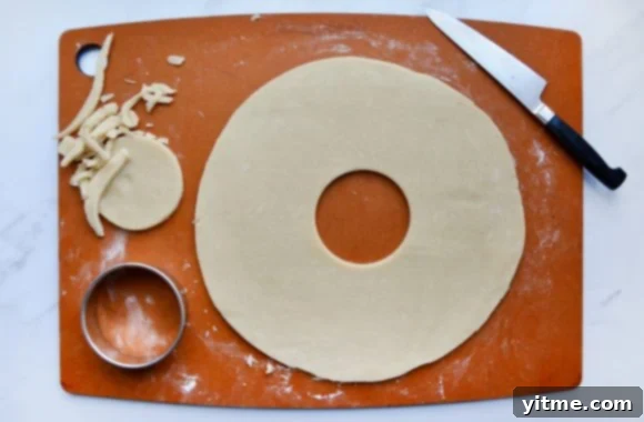 Samoa Dream Cake 6 Cutting board with round cookie cutter, samoas cookie dough and knife