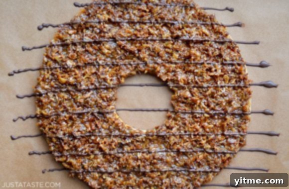 Samoa Dream Cake 9 Top down view of Giant Samoas Cookie Cake drizzled with chocolate