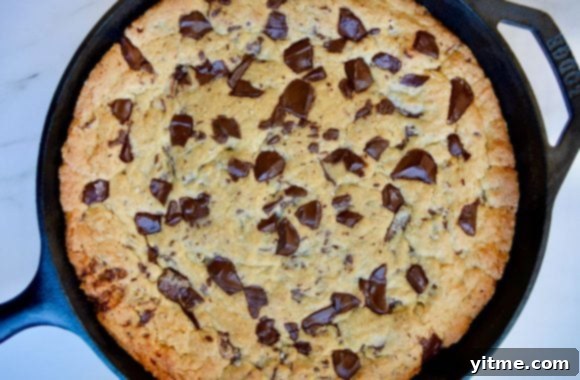 Top down view of freshly baked skillet chocolate chip cookie