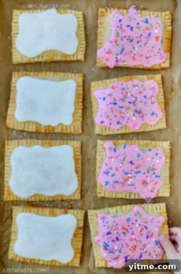 Homemade Pop Tarts: Double the Deliciousness 8 Top down view of Homemade Pop Tarts Two Ways with child's hand