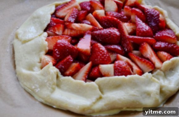 Dough filled with fresh, quartered strawberries