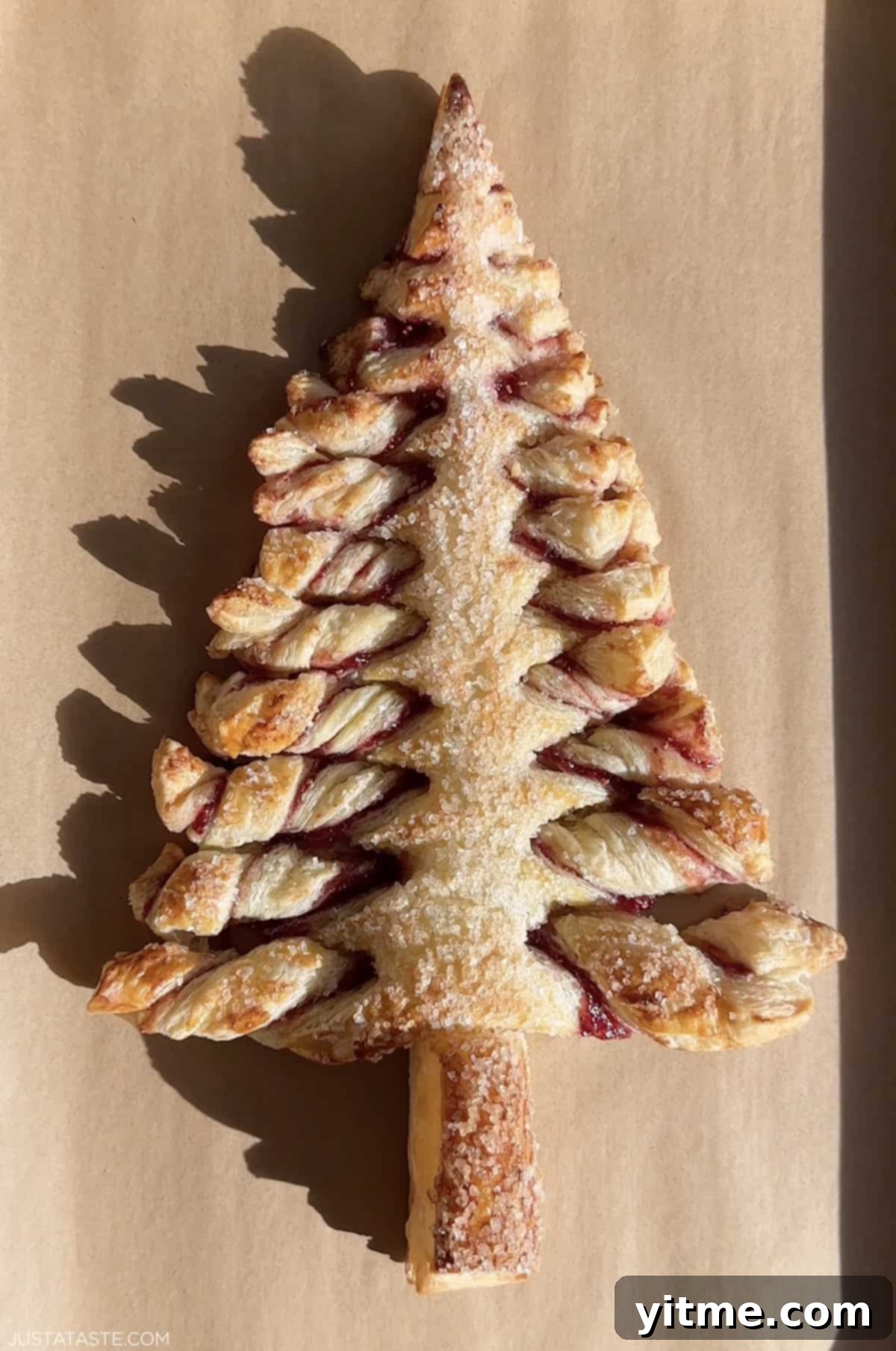 Pull-apart Christmas tree appetizer with raspberry jam.