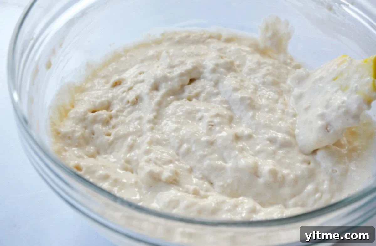 Golden Bacon Pancake Sticks 4 Lumpy pancake batter in a glass bowl.