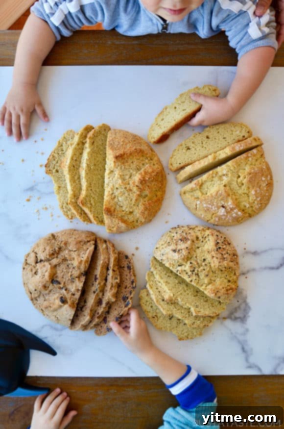 No-Fuss Yeast-Free Breads: Quick & Simple Recipes 2 Little boys reaching for sliced loaves of bread on a table, enjoying homemade no-yeast bread