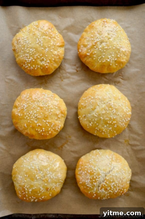 Six Quick Homemade Burger Buns Without Yeast on parchment paper-lined baking sheet