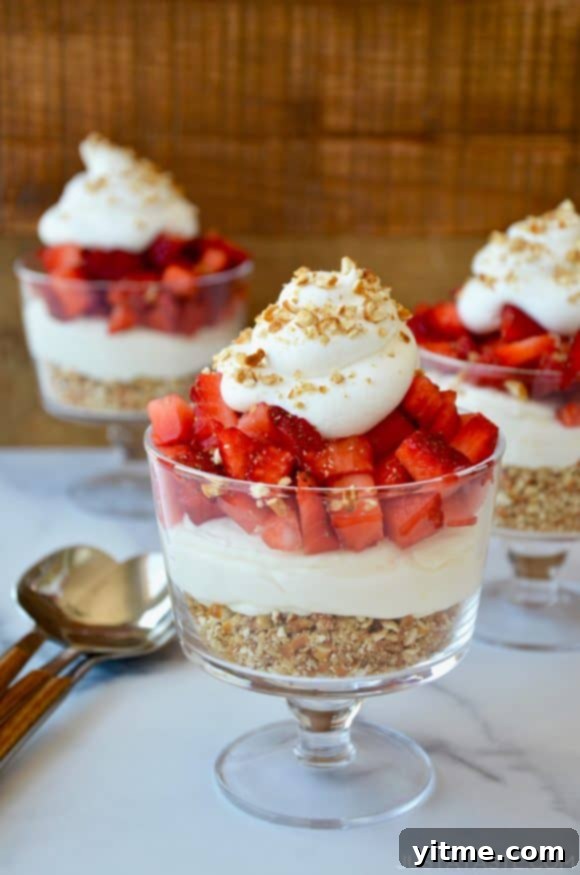 The best Strawberry Pretzel Dessert Cups topped with whipped cream