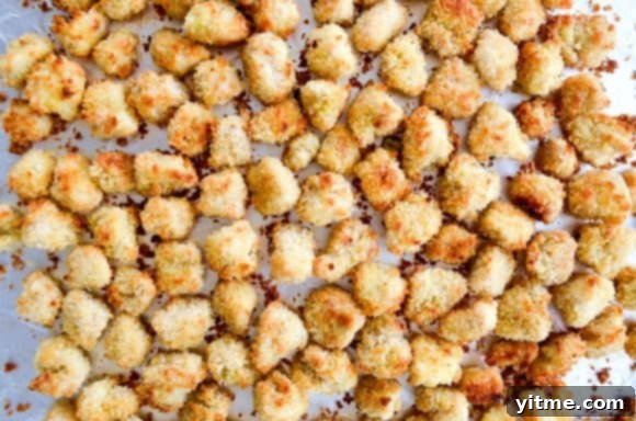 Perfectly crispy baked popcorn chicken, golden brown and ready to enjoy