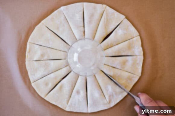 Effortless Snowflake Pastry Delight 6 Two puff pastry sheets sandwiched together with Nutella, showcasing the even distribution of the filling.