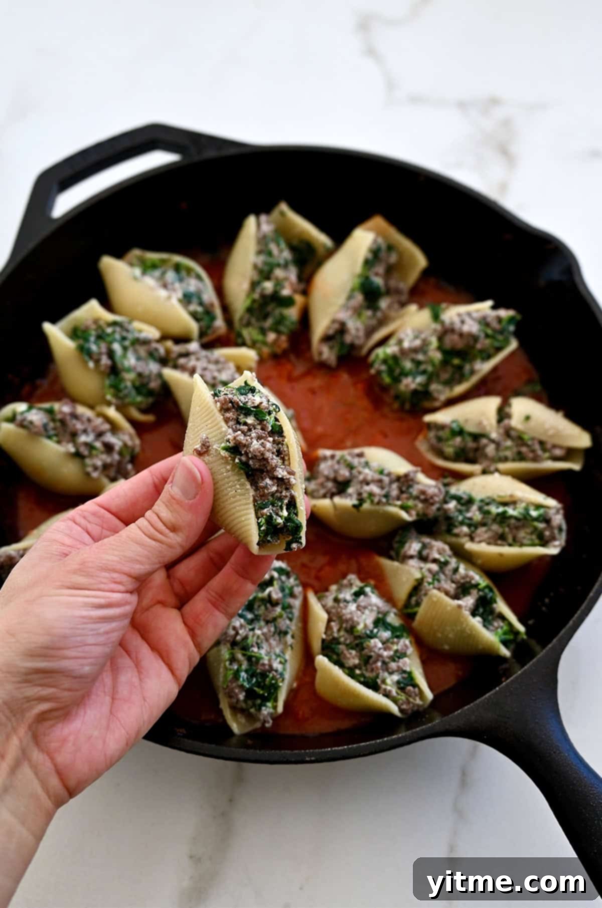 Stuffed shells with ground meat, ricotta and spinach filling.