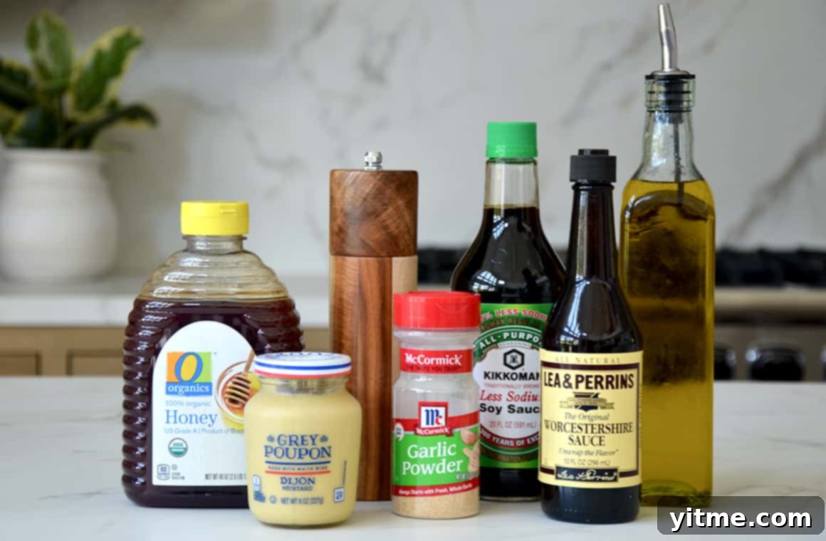 Marinade ingredients for tri-tip, including honey, Dijon mustard, garlic powder, soy sauce and Worcestershire sauce