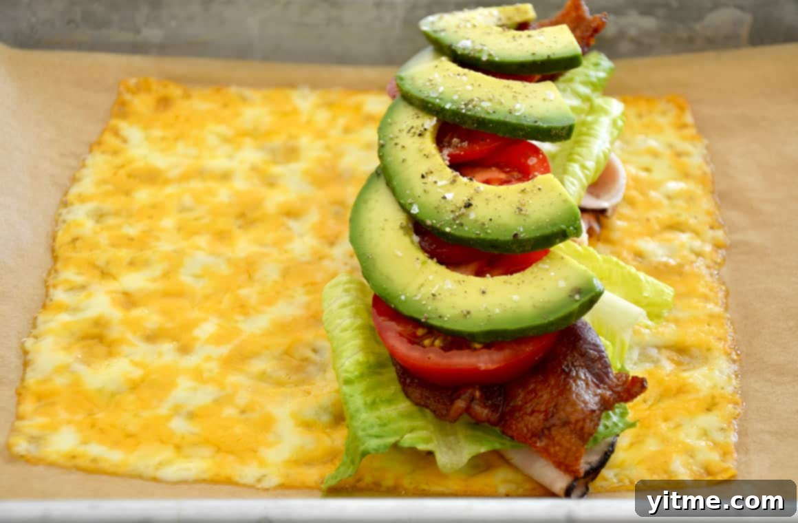 Cheesy Keto Wraps 5 Melted cheese topped with sandwich fillings