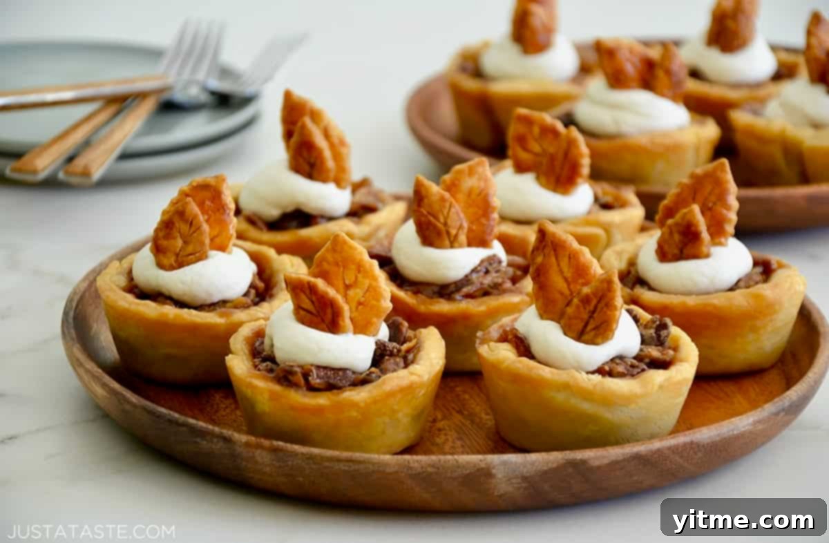 Mini pecan pies with whipped cream