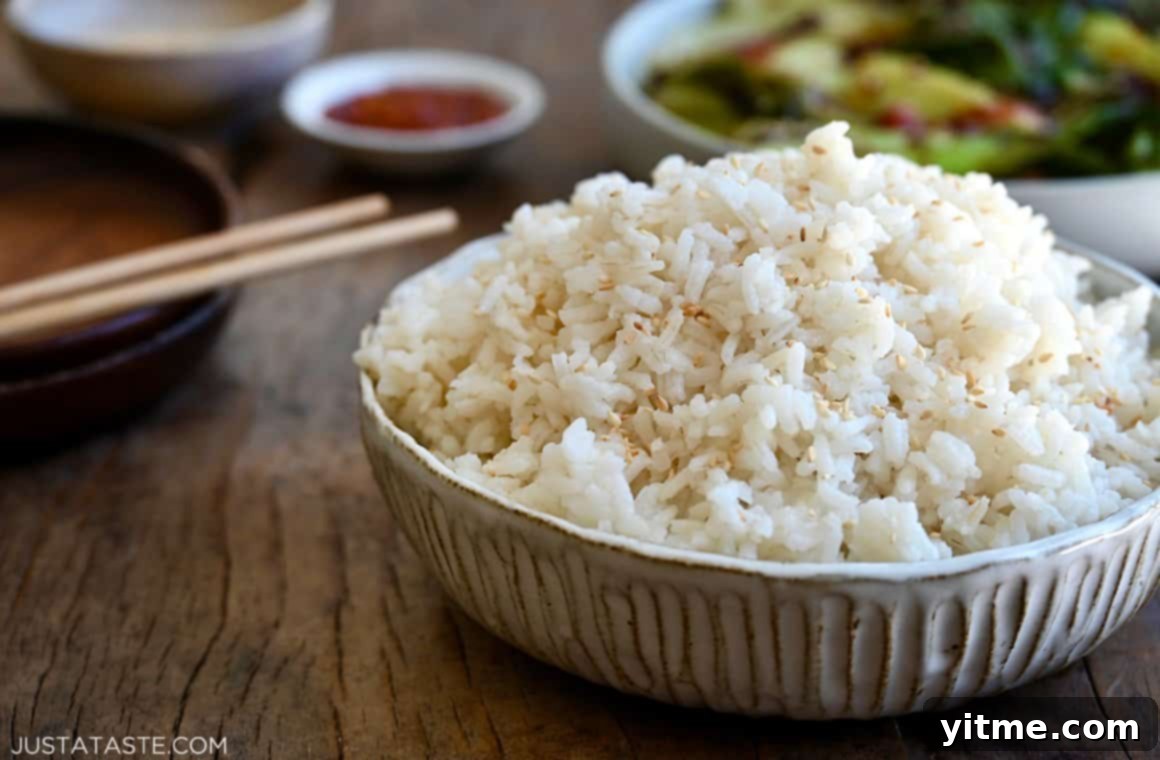 Luscious Coconut Rice: A Tropical Culinary Delight 6 Bowl of creamy coconut rice with chopsticks