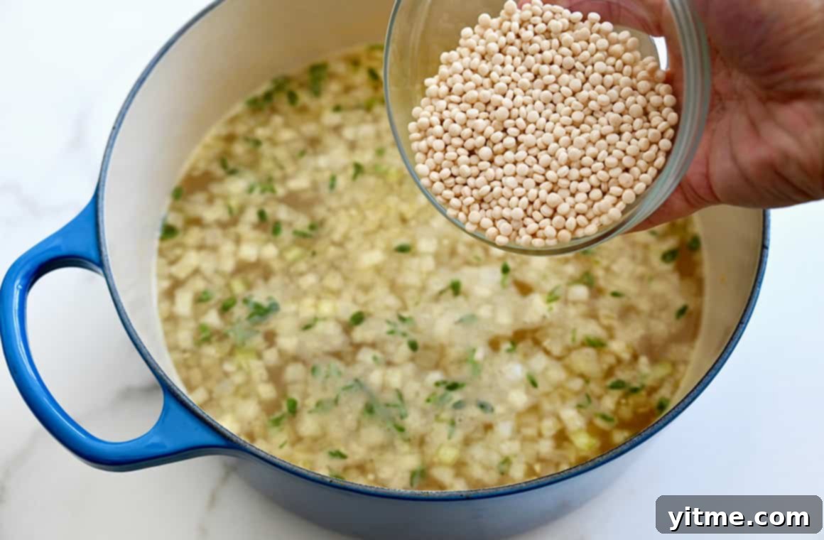 Hearty Turkey Noodle Soup 4 Adding couscous to the turkey soup