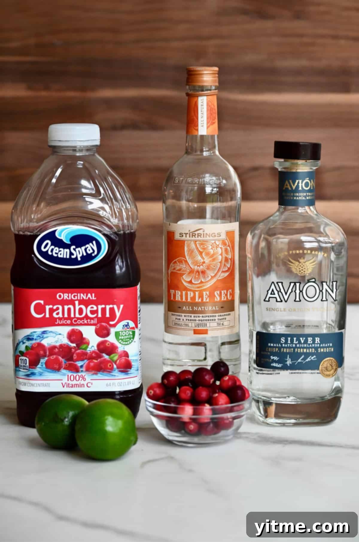 Ingredients for Christmas Margarita: Cranberry juice, tequila, Triple Sec, limes, cranberries