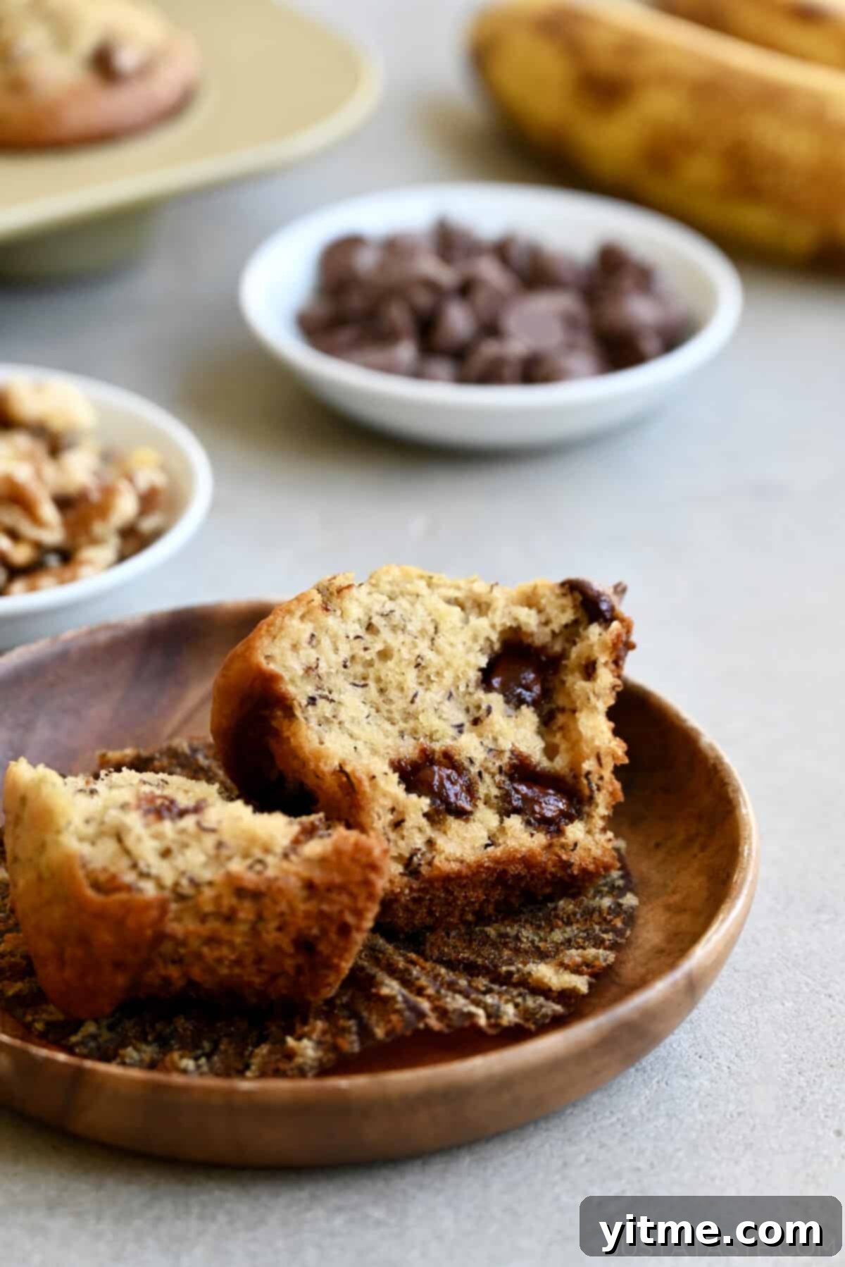 Greek Yogurt Banana Muffins
Deliciously Healthy: Greek Yogurt Banana Muffins 4 A banana chocolate chip muffin split open on a plate.