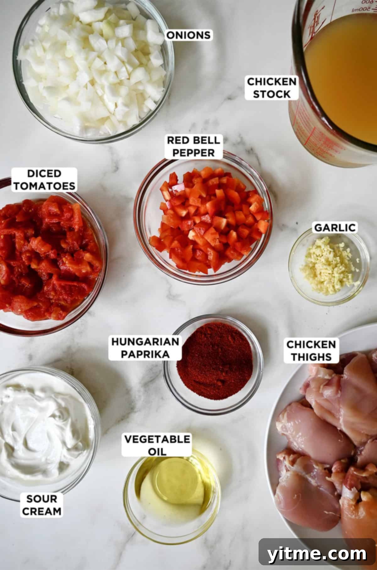 Ingredients for Paprikash in glass bowls.