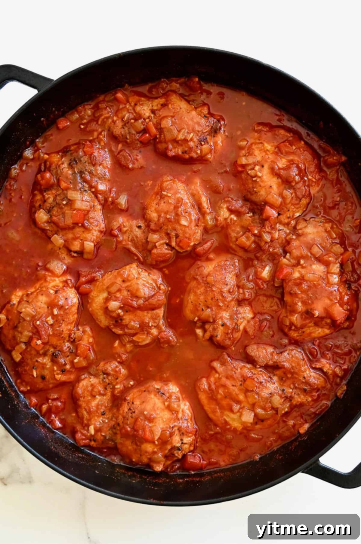 Paprika chicken in a skillet.