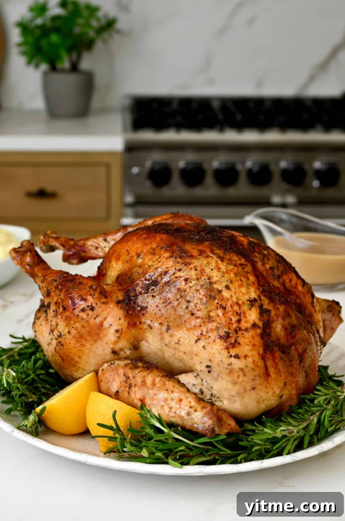 Perfectly roasted turkey, ready to be carved and enjoyed for Thanksgiving dinner.