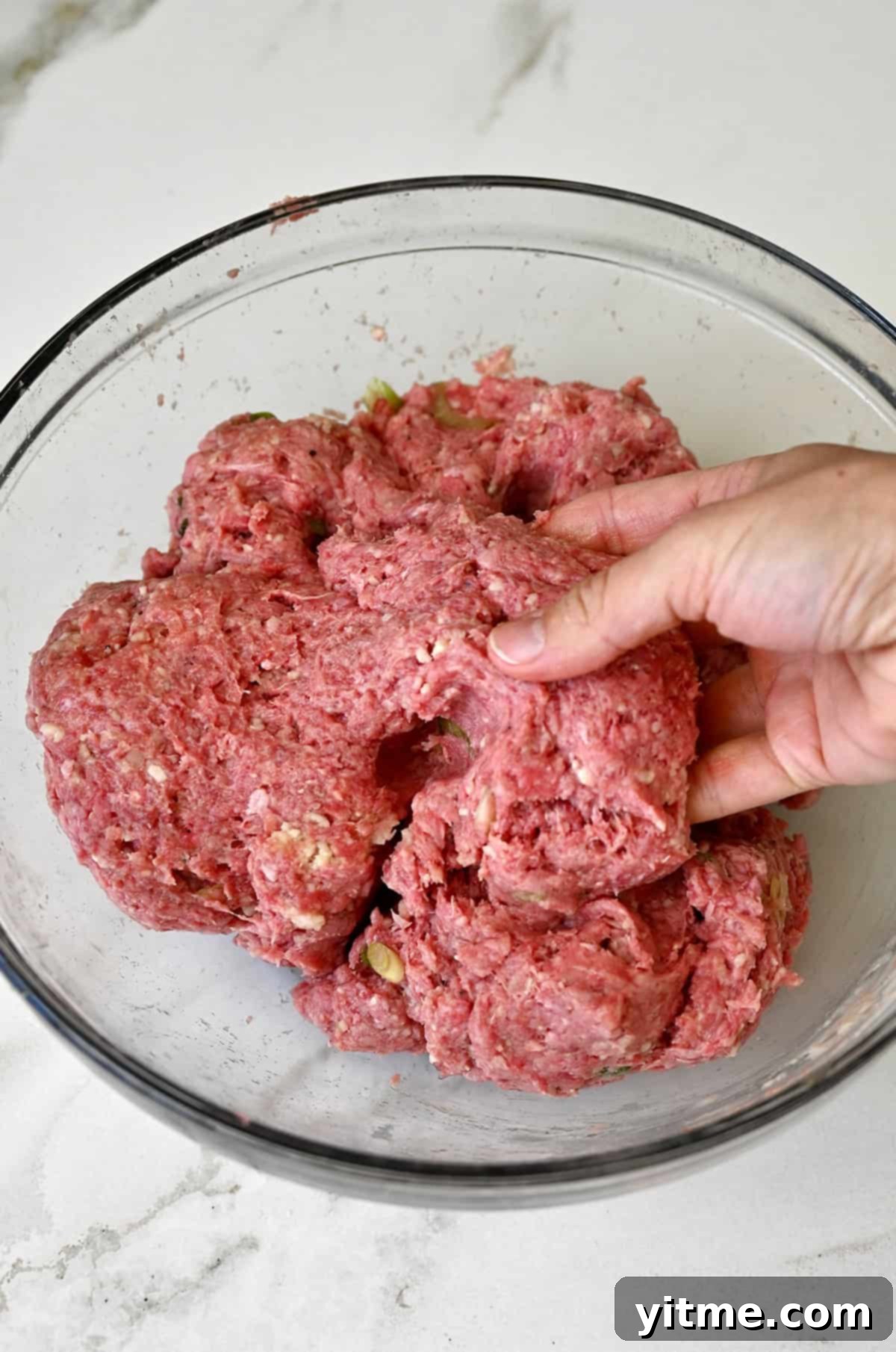 Ground beef meatball mixture.