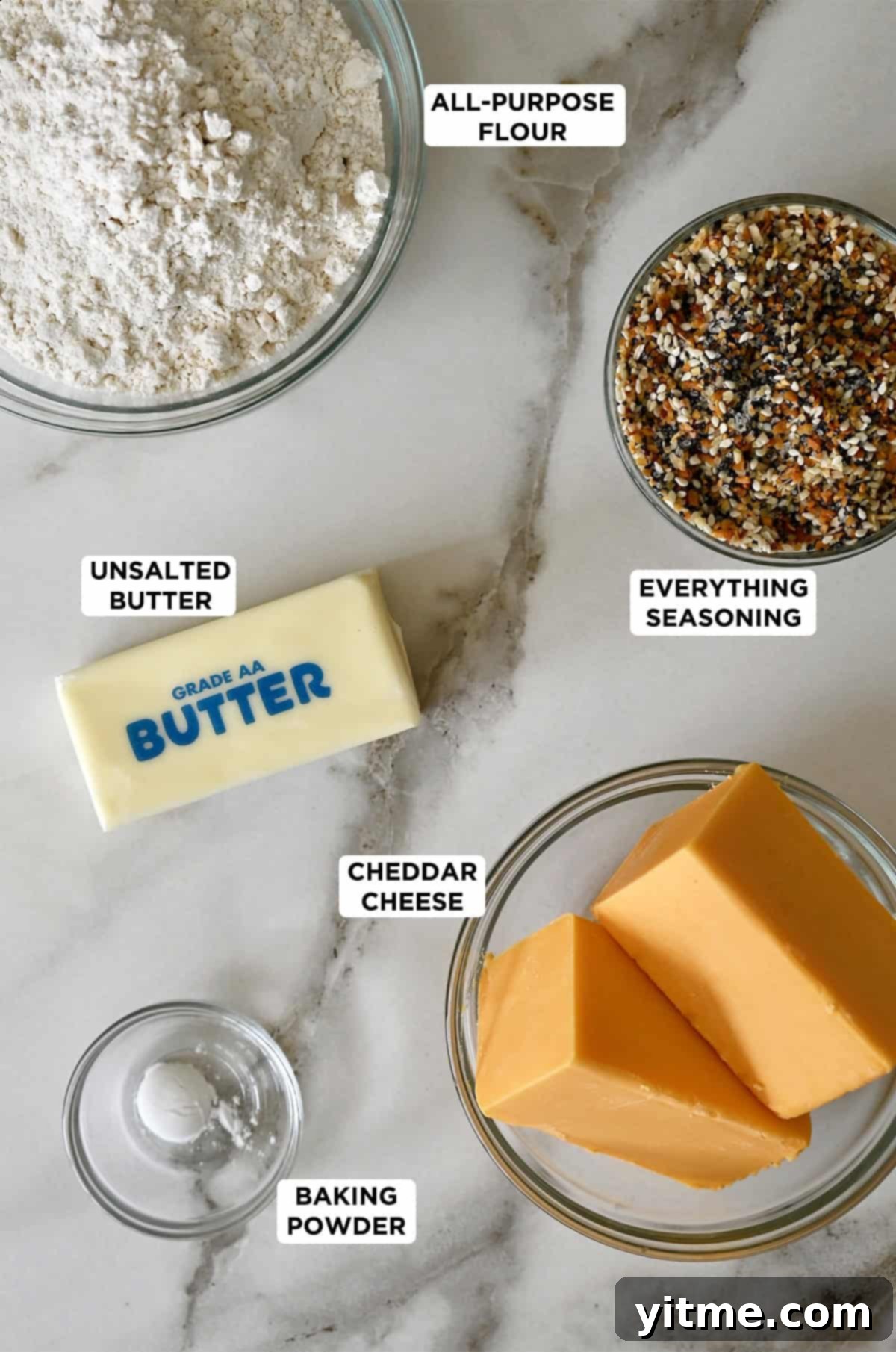 Savory shortbread ingredients in glass bowls.