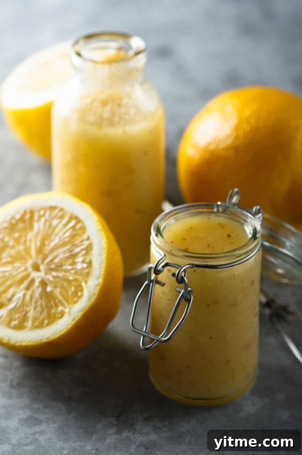 Homemade lemon vinaigrette salad dressing in a glass jar.