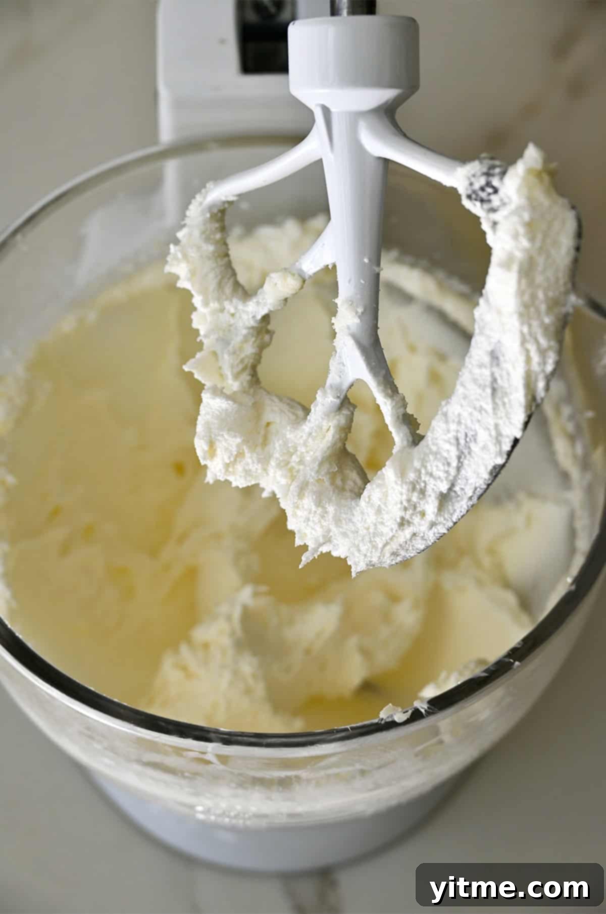 Whipped butter in a stand mixer. The key to light and fluffy cookies.