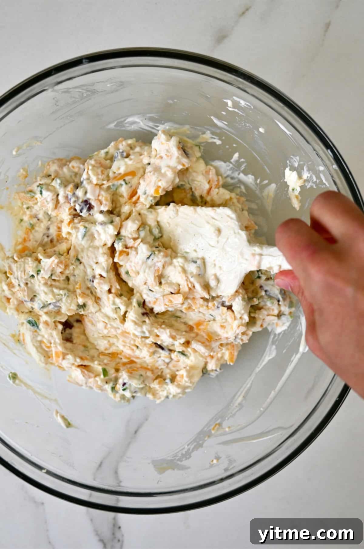 Cream cheese popper dip mixture in a bowl.