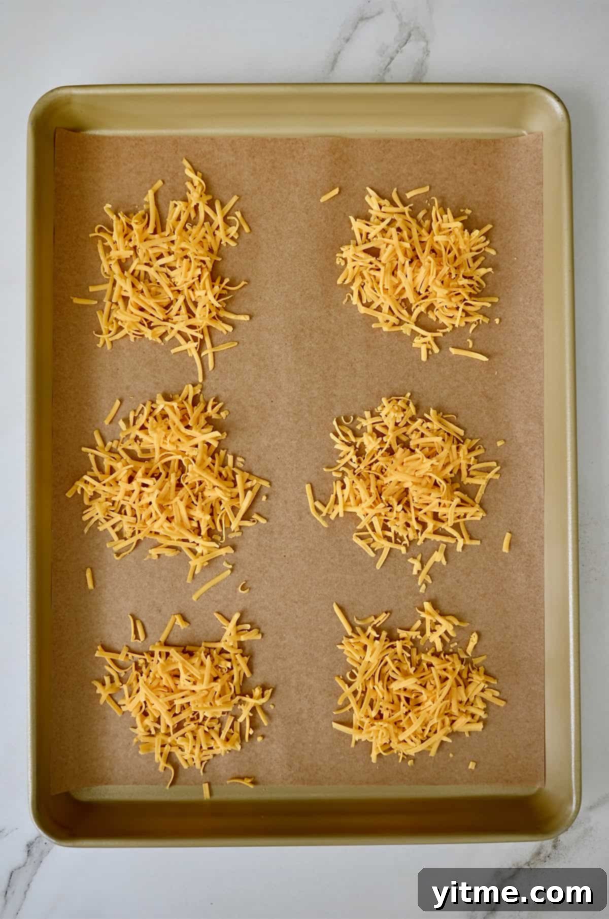 Buffalo Chicken Salad Sensation 8 Shredded cheese on parchment paper