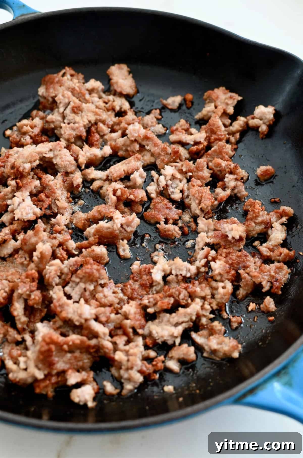 Browning breakfast sausage in a skillet