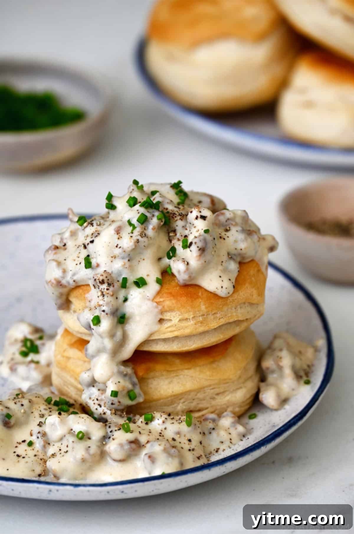 Sausage gravy and biscuits on a plate