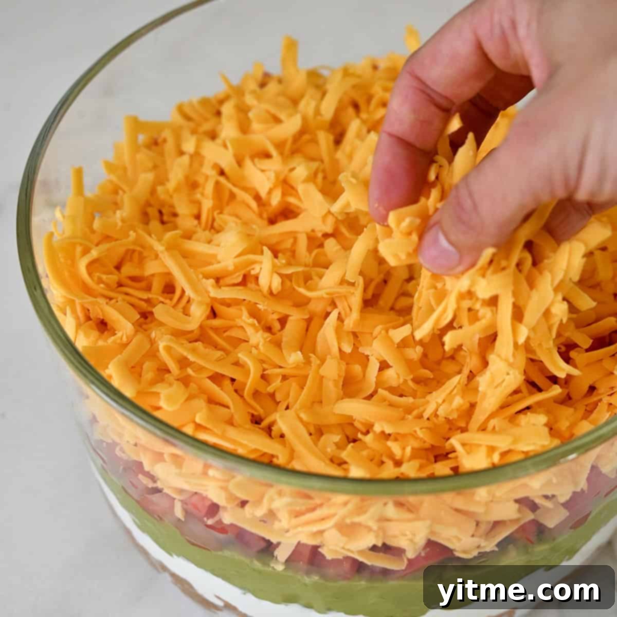 Adding diced tomatoes.