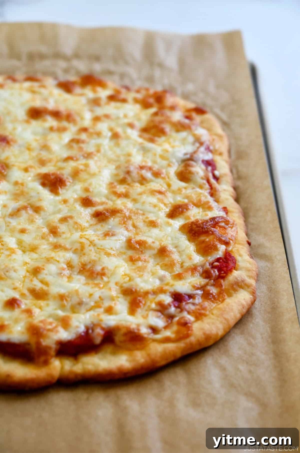 Baked cheese pizza with a cottage cheese crust.