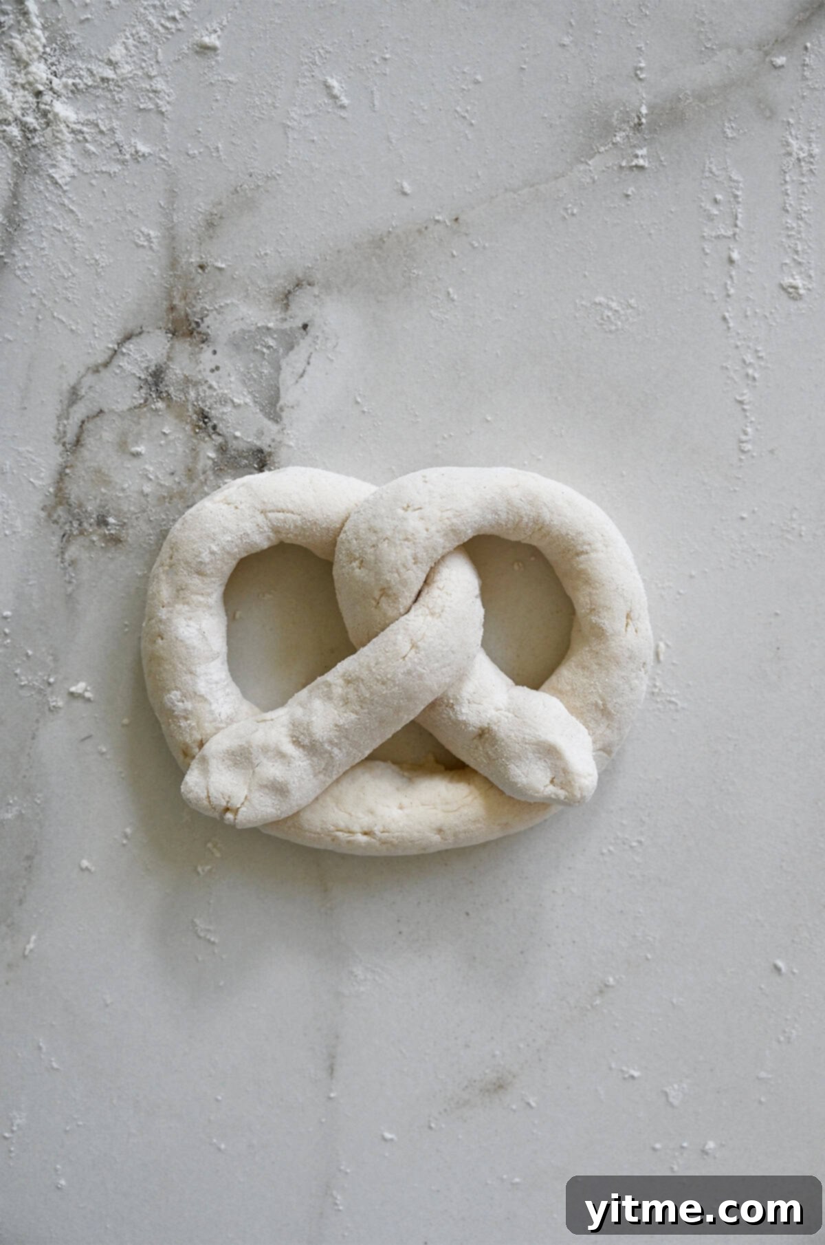 Folding pretzel dough